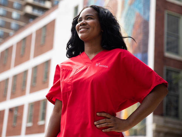 a woman in a red shirt
