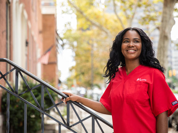 a woman in a red scrubs