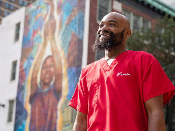 a man in a red shirt