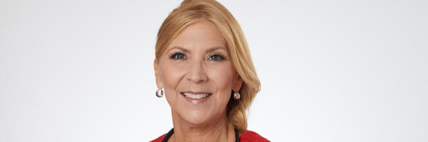 a woman wearing a stethoscope around her neck