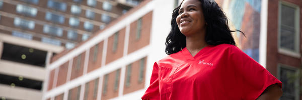 a woman in a red scrubs