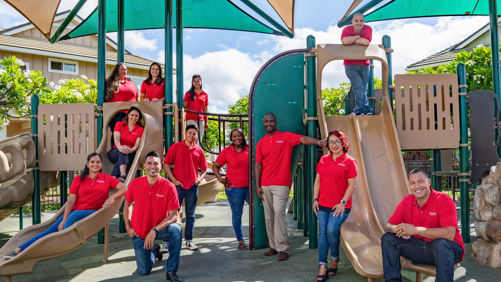 a group of people in red shirts