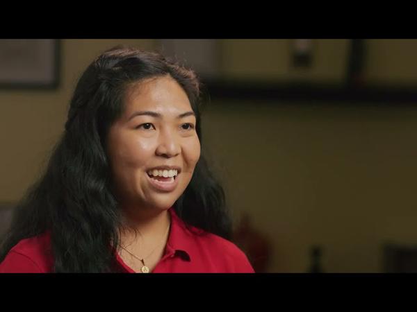 a woman in a red shirt