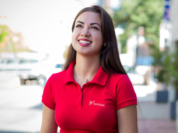 a woman in a red shirt