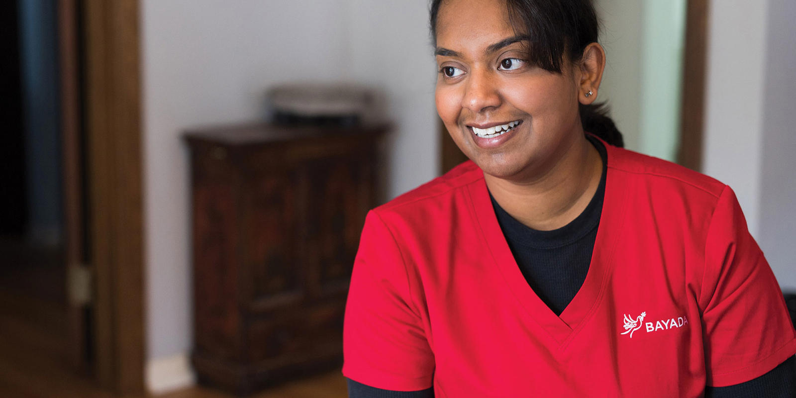 a woman in a red shirt