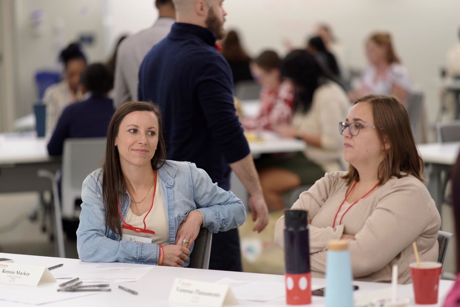 a group of people sitting at a table