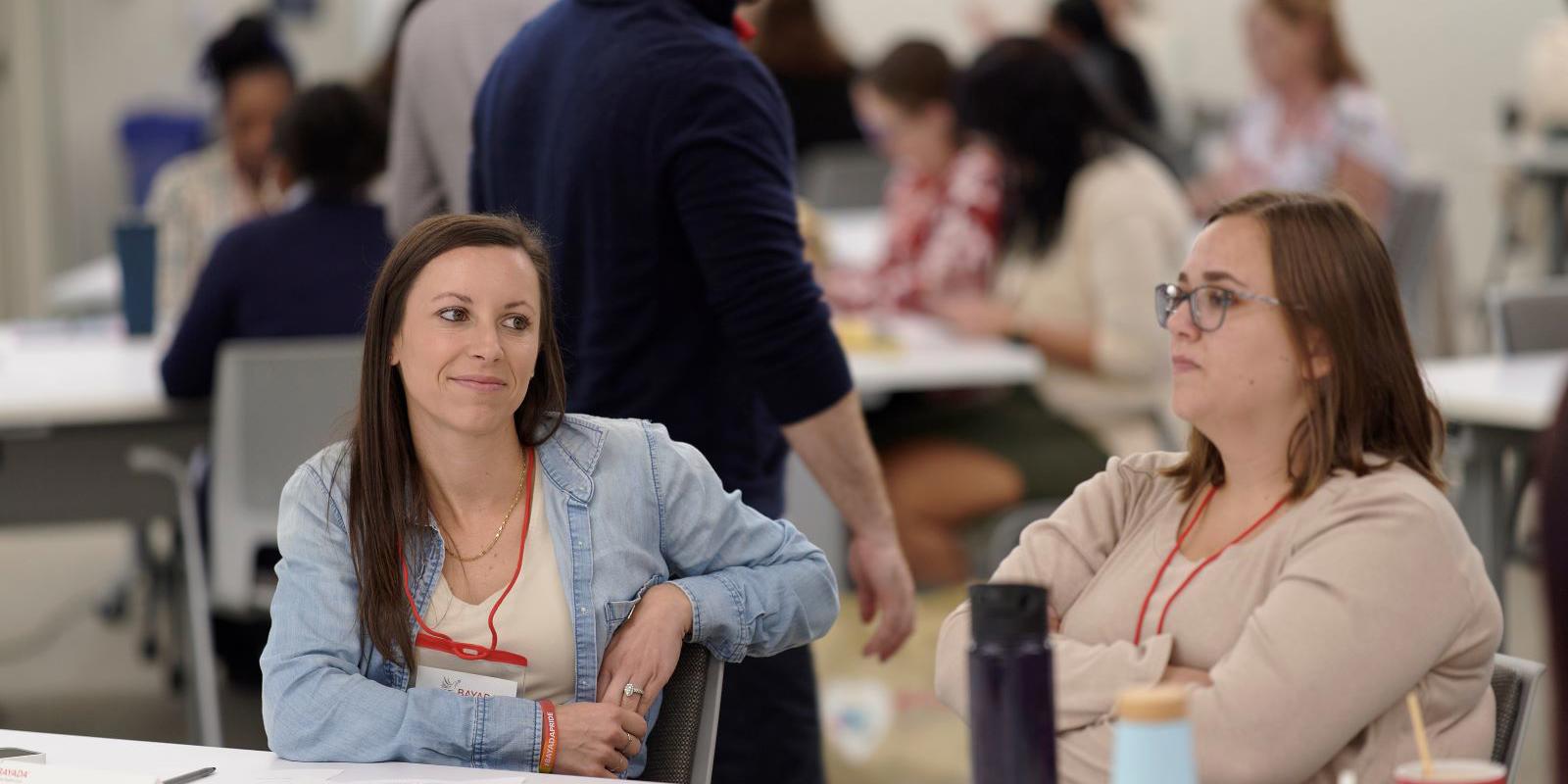 a group of people sitting at a table